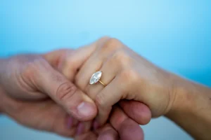 Vintage-inspired engagement ring with diamond center stone