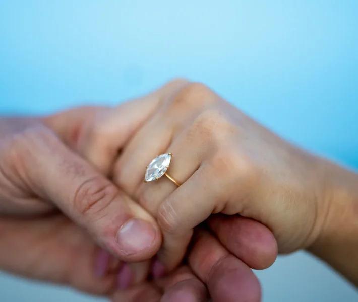 Vintage-inspired engagement ring with diamond center stone