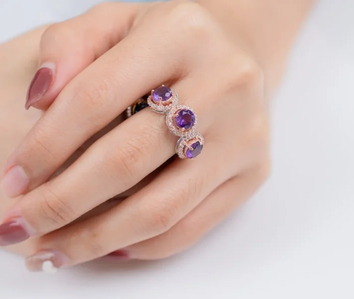 Promise ring with gemstone in gold setting